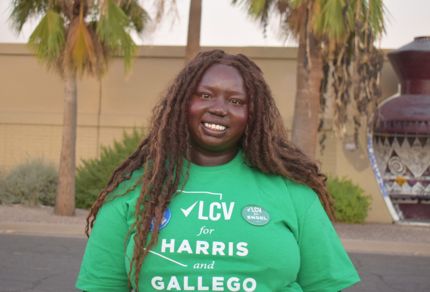 Achol stands outside in Arizona.