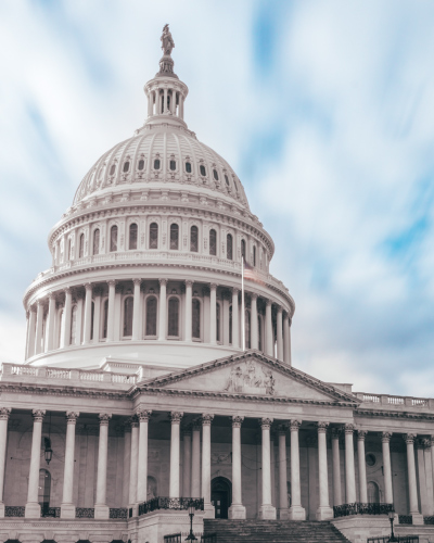 U.S. Capitol Building against a cloudy sky