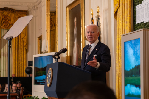 President Biden speaks at a podium.