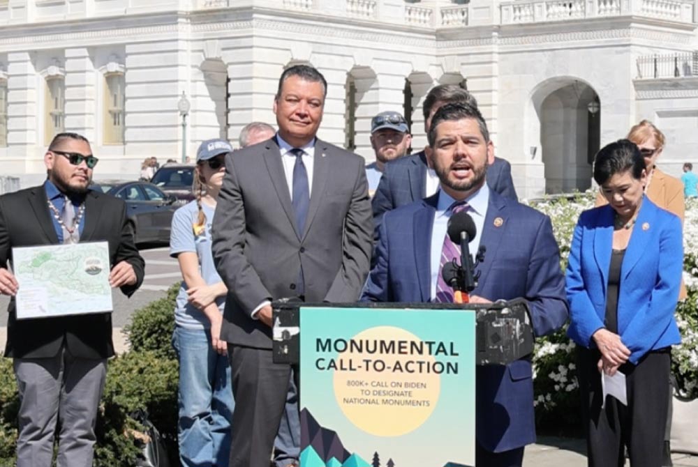 Representative Ruiz announcing the Chuckwalla National Monument at a podium.