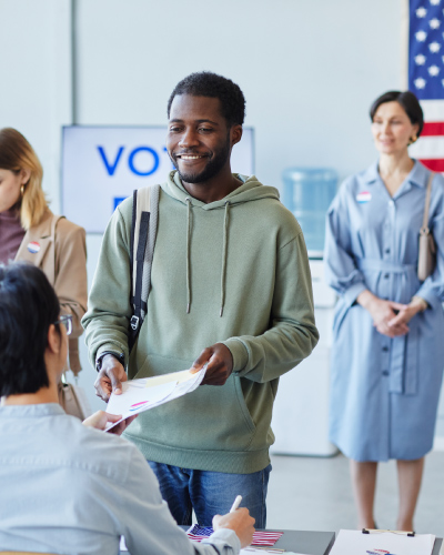 Voters check in to vote at polling station