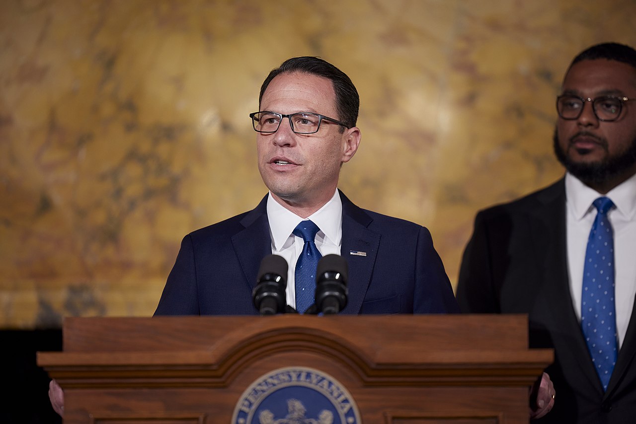 Pennsylvania Governor Josh Shapiro speaks at a podium.